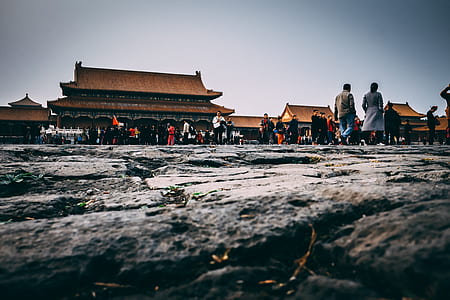 landscape photography on ancient building with people thumbnail