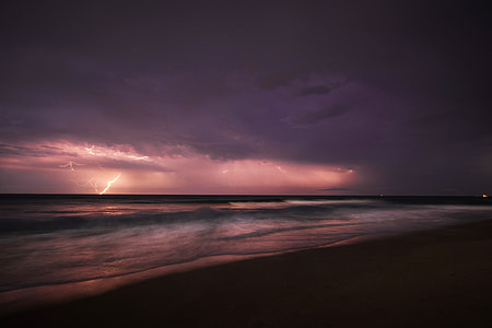 seashore photo during thunder storm thumbnail