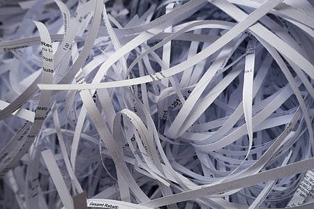 fringe of white printer papers thumbnail