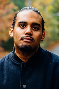portrait photo of man with black beard thumbnail