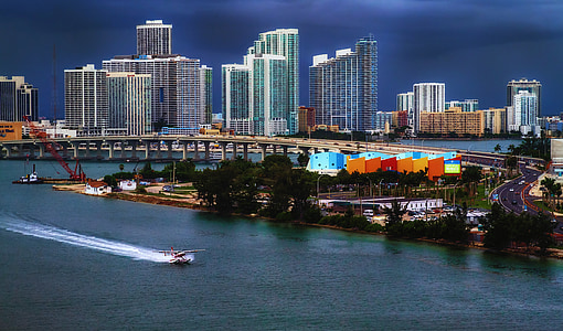 aerial photography of building near body of water during daytime thumbnail