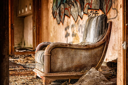 gray armchair with brown wo oden frame thumbnail