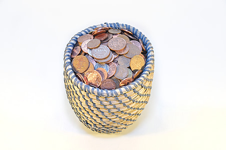coin lot inside beige wicker basket thumbnail