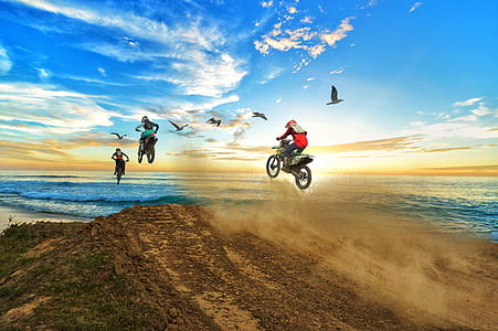 motocross dirt bikes near body of water thumbnail