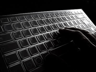 person holding computer keyboard thumbnail