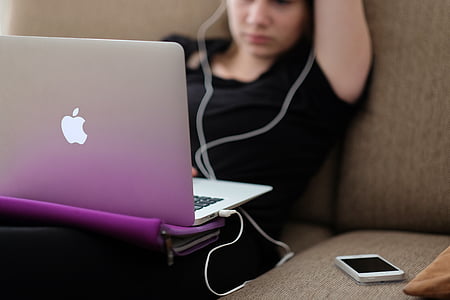 woman using MacBook thumbnail
