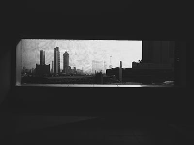 grayscale photography of city buildings thumbnail