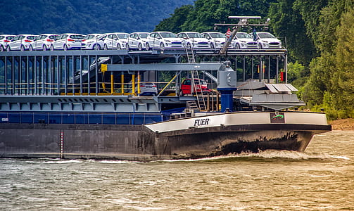 black and gray ship with cars thumbnail