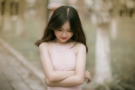Shallow Focus Photography of Woman in Pink Dress thumbnail