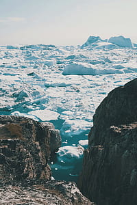 ice formation on body of water during daytime thumbnail