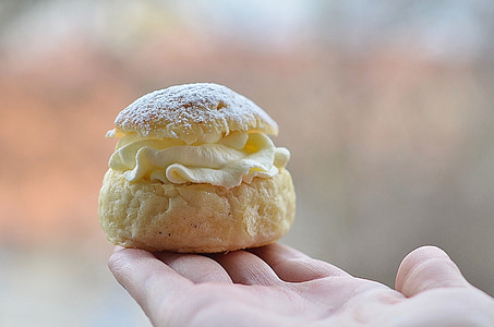 cupcake on person's hand thumbnail