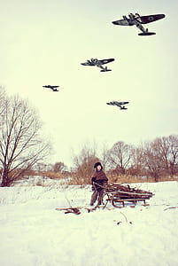 person standing beside cart during snow thumbnail