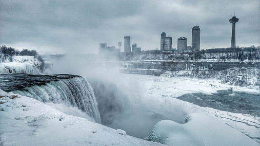 time-lapse photography of waterfalls and city thumbnail