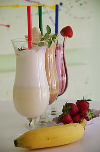 three cocktail glasses with desserts inside thumbnail