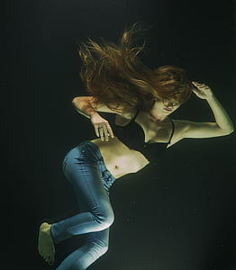 woman wearing black underwire bra and blue jeans thumbnail