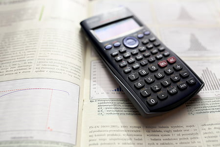 black scientific calculator on book thumbnail