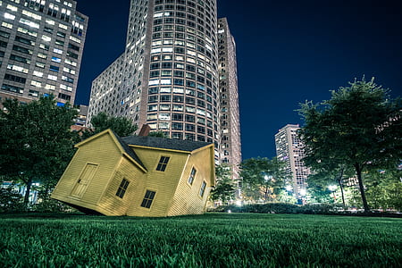 green lawn grass with white house decor during night time thumbnail