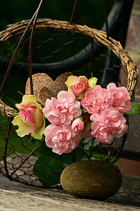 pink flowers and brown stone thumbnail