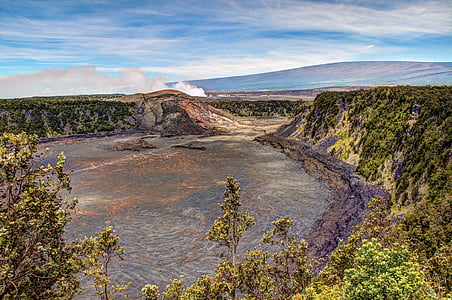 body of water surrounded by mountain thumbnail
