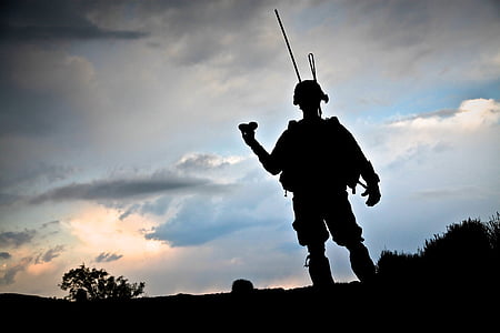 soldier standing during sunset thumbnail