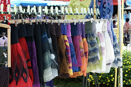 assorted-color clothes lot on display photography thumbnail