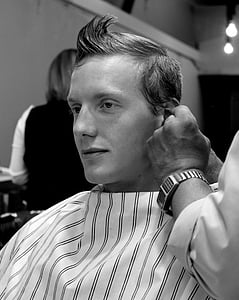 grayscale photography of barber cutting hair of a man thumbnail