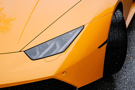 orange vehicle closeup photography thumbnail