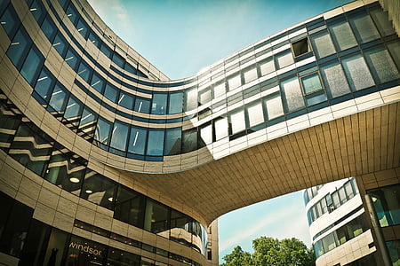brown and black building during daytime thumbnail