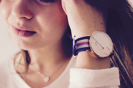 woman wearing analog watch thumbnail
