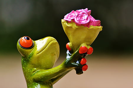 green frog holding flower bouquet figurine thumbnail