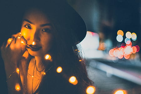 woman in black hat thumbnail