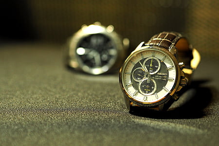 selective focus photography of chronograph watch thumbnail