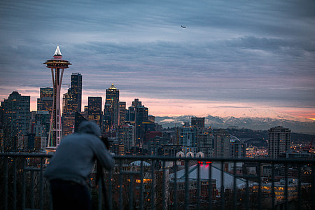 person standing in front of black steel handrail thumbnail