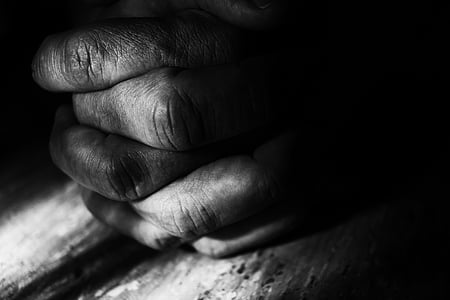 human hand on gray wooden frame thumbnail