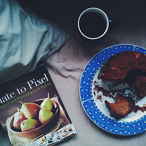 Homemade bun with tea and a book thumbnail