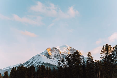icy mountain under blue sky thumbnail