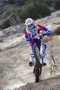 man riding motocross dirt bik thumbnail