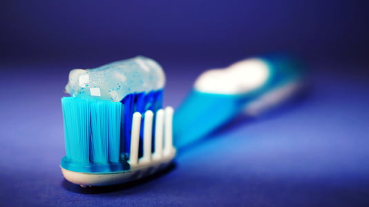 shallow focus photography of toothbrush thumbnail