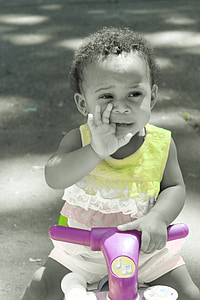 toddler wearing lace tank top sitting on trike thumbnail