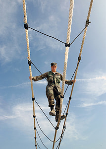 man crossing training rope thumbnail