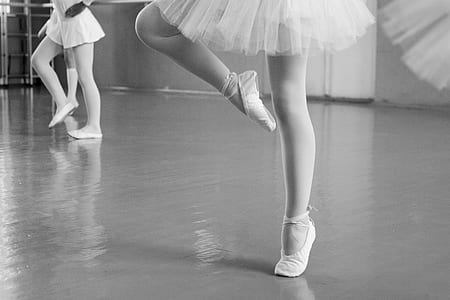 ballerinas performing in building grayscale photography thumbnail