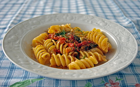 pasta dish on top of round white plate thumbnail