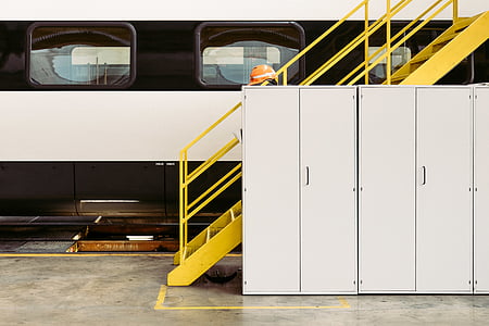 white metal locker near yellow stairs thumbnail