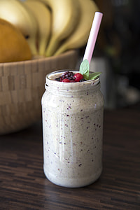 shallow focus photography of milk shake filled in glass jar thumbnail
