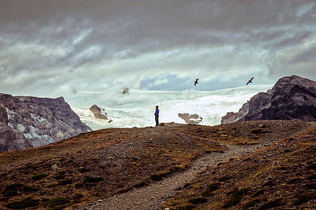man standing on mountain thumbnail