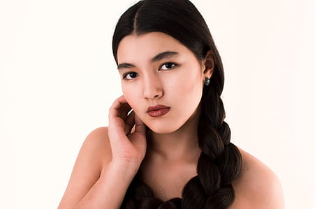 woman holding her hair thumbnail