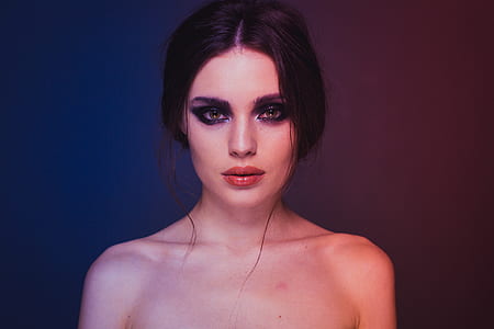 woman wearing red lipstick and black eyeshadow thumbnail