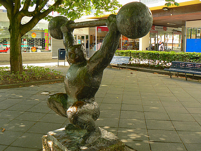 weightlifter statue during daytime thumbnail