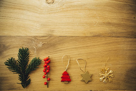five assorted Christmas decors on wood thumbnail