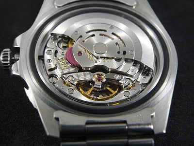 round silver-colored chronograph watch with link bracelet thumbnail